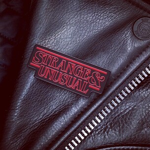 Strange & Unusual - Enamel Pin 